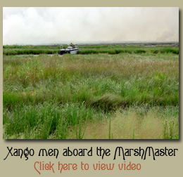 Xango men aboard the Marsh Master