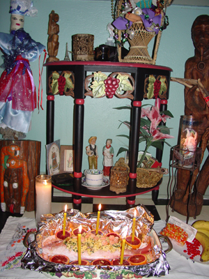 Voodoo Altar with offerings of fruit and fish
